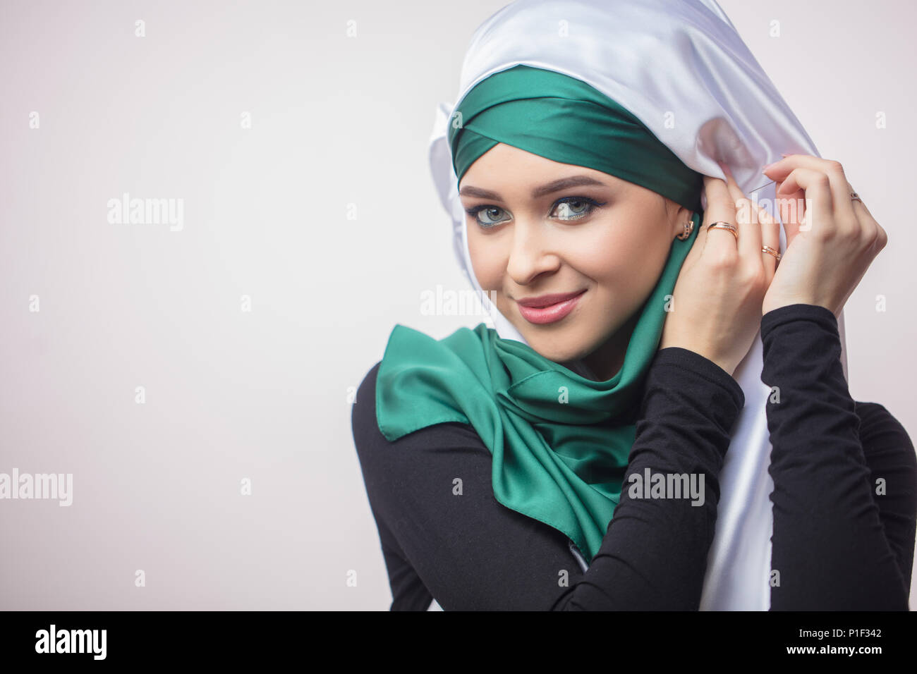 Close Up Portrait Od Beautiful Muslim Girl Showing How To Tie A 