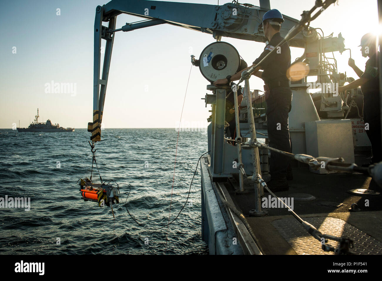 161021-N-SB587-0631    The mine countermeasure ship HMS Chiddingfold (M37) launches a Seafox unmanned underwater vehicle to search for an inert training mine dropped by the U.S. Navy mine countermeasure ship USS Dextrous (MCM 13) during U.K./U.S. Mine Countermeasures Exercise 17-1 in the Arabian Gulf Oct. 21, 2016.  The bilateral exercise serves to enhance cooperation, mutual MCM capabilities and interoperability between the U.S. and UK Naval forces in ensuring free flow of commerce, freedom of navigation and long-term regional security. (U.S. Navy Combat Camera photo by Petty Officer 2nd Clas Stock Photo