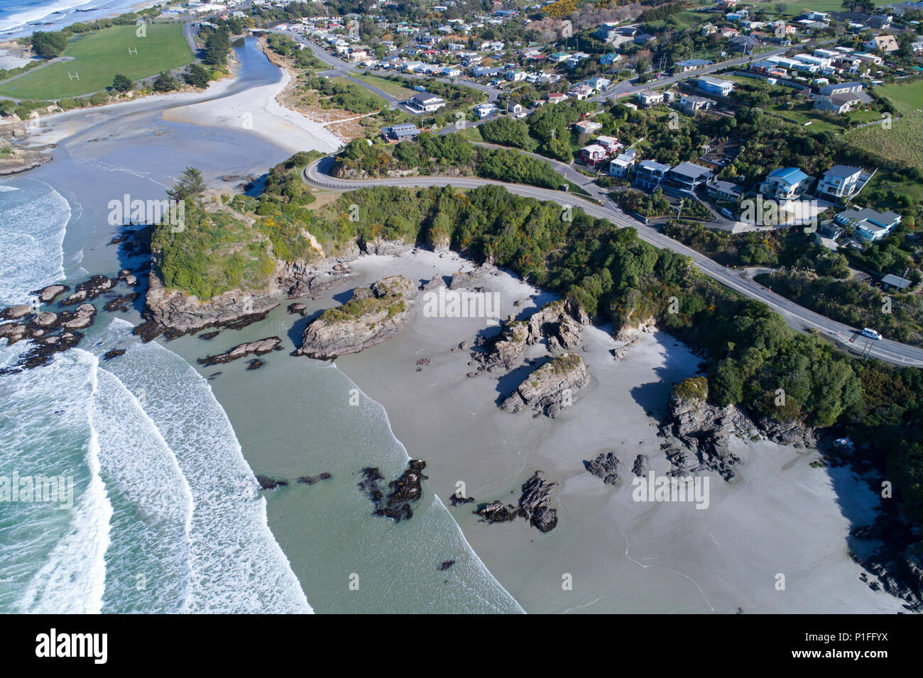 Brighton Beach and Big Rock Corner, Brighton, Dunedin, South Island, New Zealand - drone aerial Stock Photo