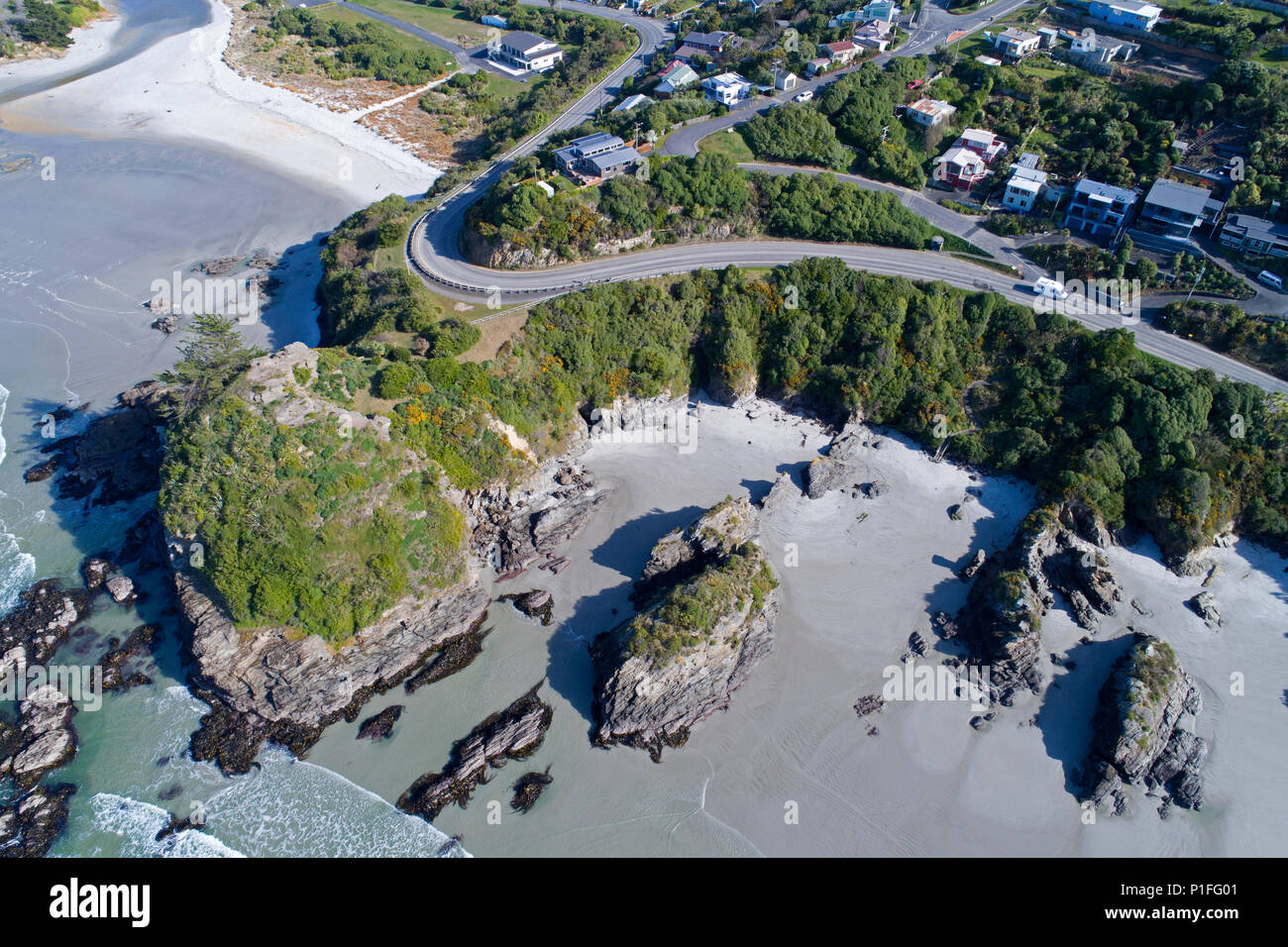 Big Rock Corner, Brighton, Dunedin, South Island, New Zealand - drone aerial Stock Photo