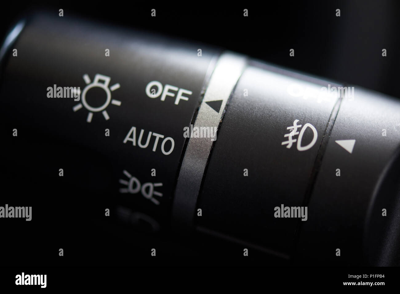 Changing headlight stick of modern car close-up. Car light control system Stock Photo