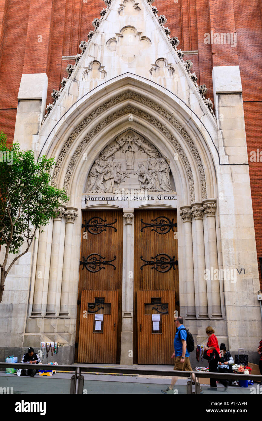 Main front doors to the Parraquia de Santa Cruz, Iglesia de la Santa Cruz, on Calle Atocha, Madrid, Spain. May 2018 Stock Photo