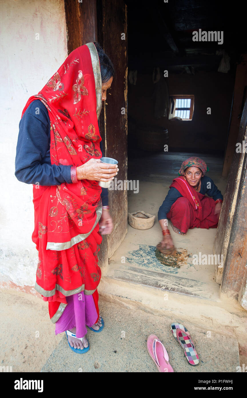Indian womans at their house, Dalkanya village, Nandhour Valley, Kumaon Hills, Uttarakhand, India Stock Photo