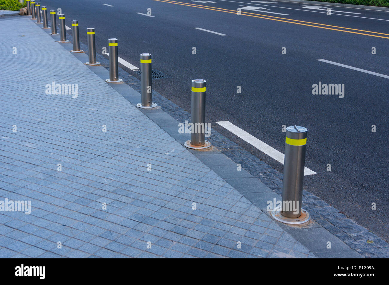 Railing Between Road and Walkway Stock Photo Alamy