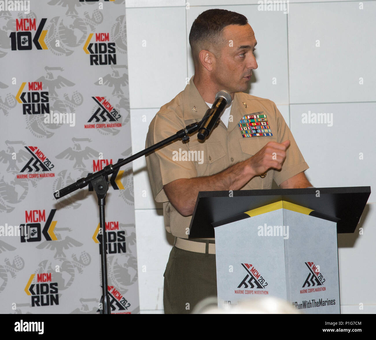 U.S. Marine Corps Col. Joseph Murray, commanding officer of Marine Corps Base Quantico, speaks at the press conferance for the 41st Marine Corps Marathon at the Wolfgang Puck Catering and Events Center at National Harbor, Md., Oct. 28, 2016. Also known as 'The People's Marathon,' the 26.2 mile race drew roughly 30,000 participants to promote physical fitness, generate goodwill in the community, and showcase the organizational skills of the Marine Corps. (U.S. Marine Corps photo by Cpl. Alexander S. Norred) Stock Photo