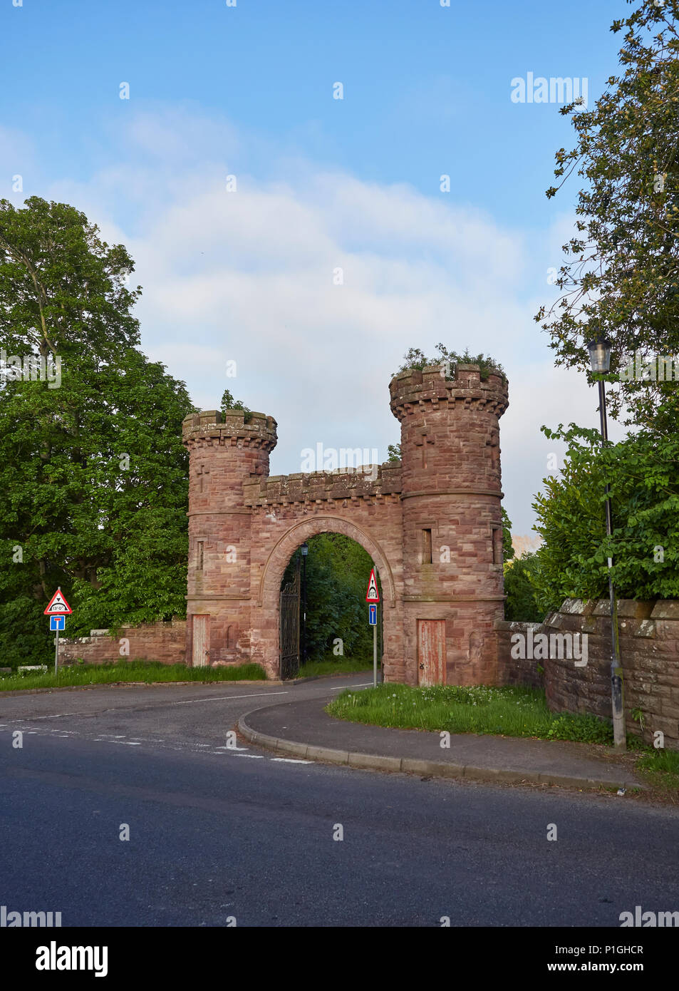 The Grade II listed red sandstone arched side entrance into the Letham