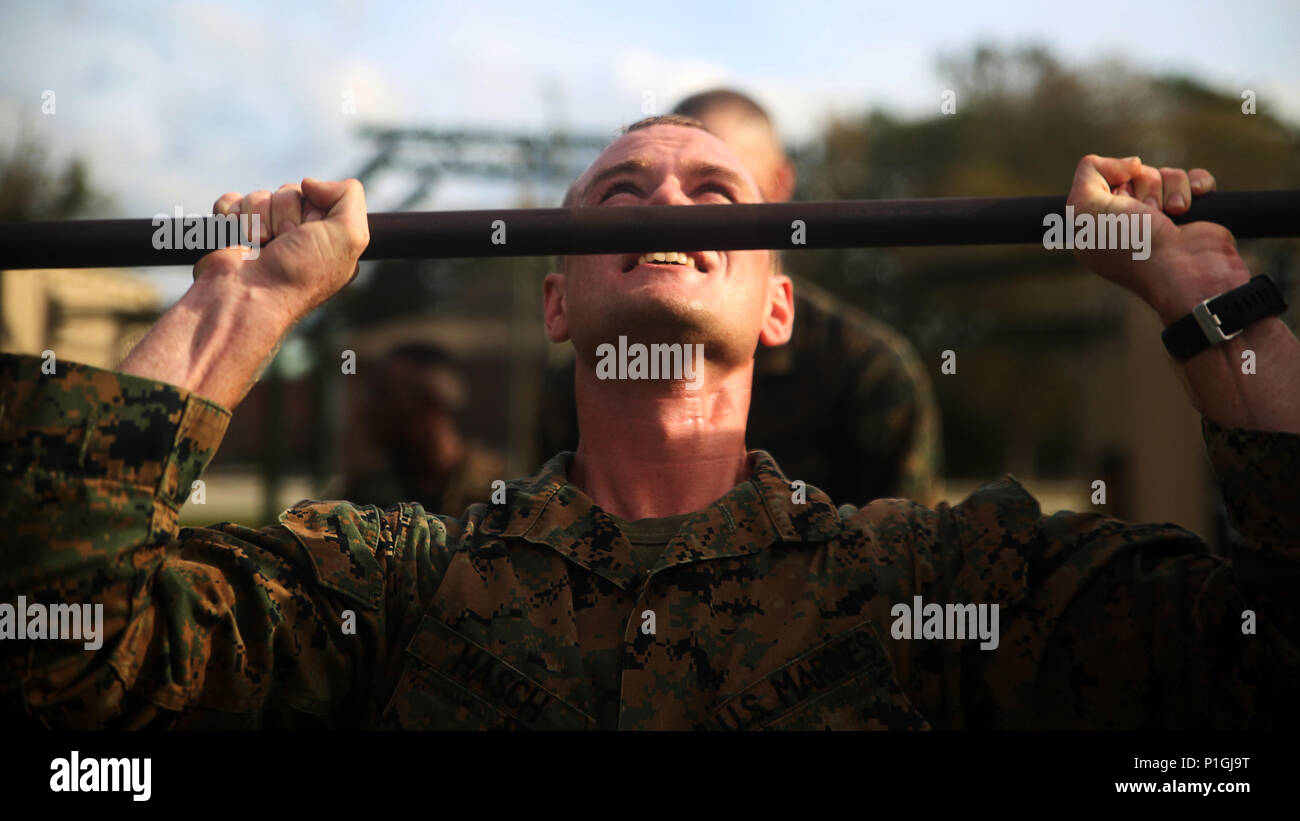 Sgt. Jason Hasch attempts an overhead press during the unit’s Raider ...