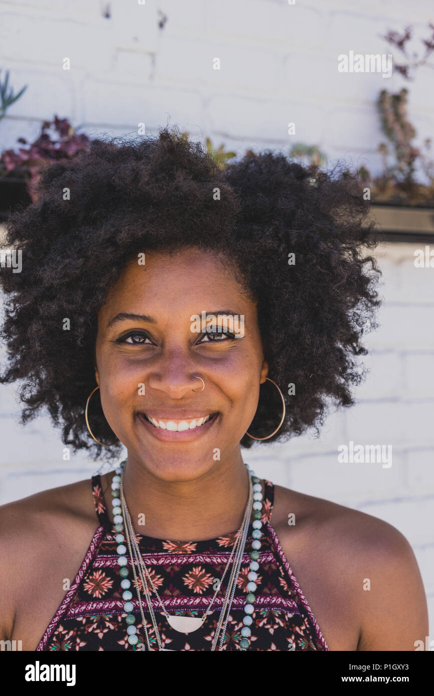 Portrait of smiling black woman Stock Photo