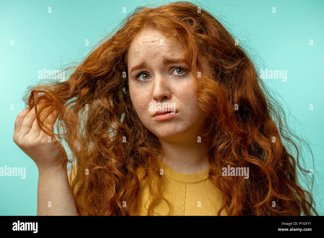 Upset And Woman With Her Damaged Dry Hair Face Expression Blue Background Stock Photo Alamy