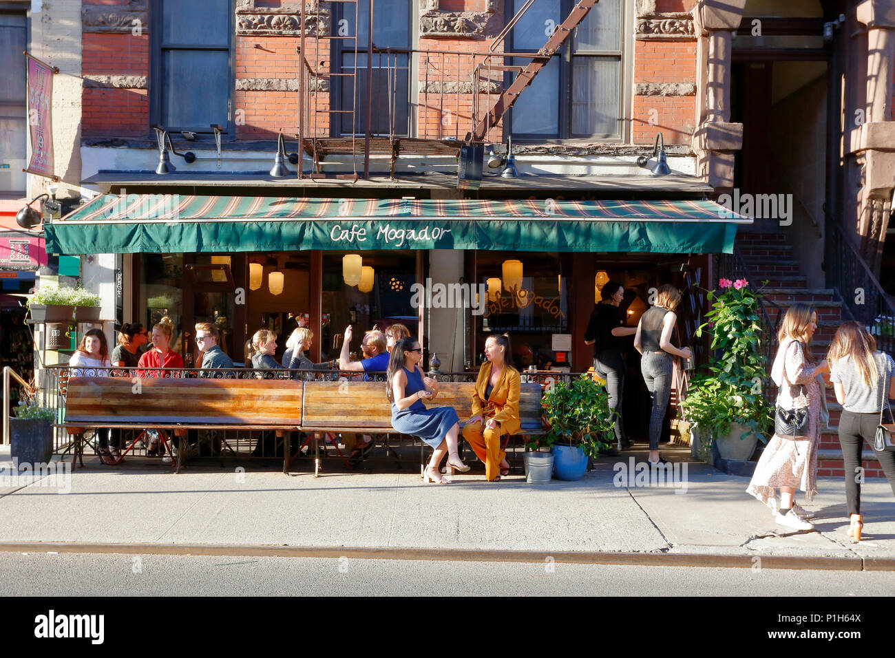 Cafe Mogador, 101 St Marks Pl, New York, NY. exterior storefront of a restaurant, and sidewalk cafe in the East Village neighborhood of Manhattan. Stock Photo