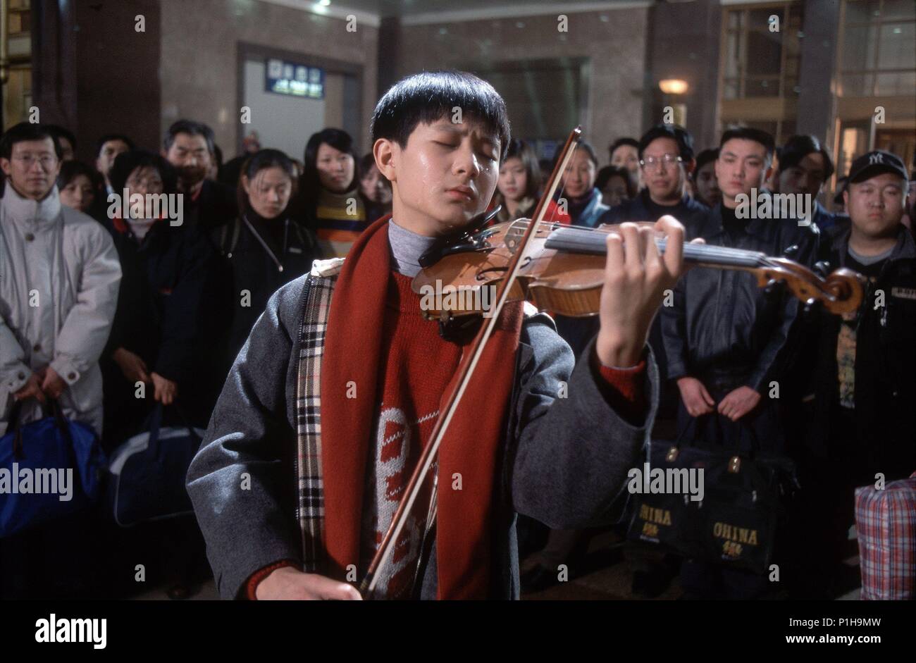 Original Film Title: HE NI ZAI YI QI.  English Title: TOGETHER.  Film Director: CHEN KAIGE.  Year: 2002.  Stars: TANG YUN. Credit: UNITED ARITSTS / ZHAO HONG YANG / Album Stock Photo