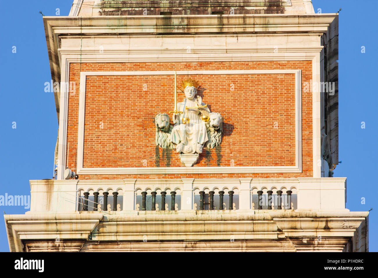 Detail showing the campanile (bell tower) in St. Mark's Square, Venice, Italy. Stock Photo