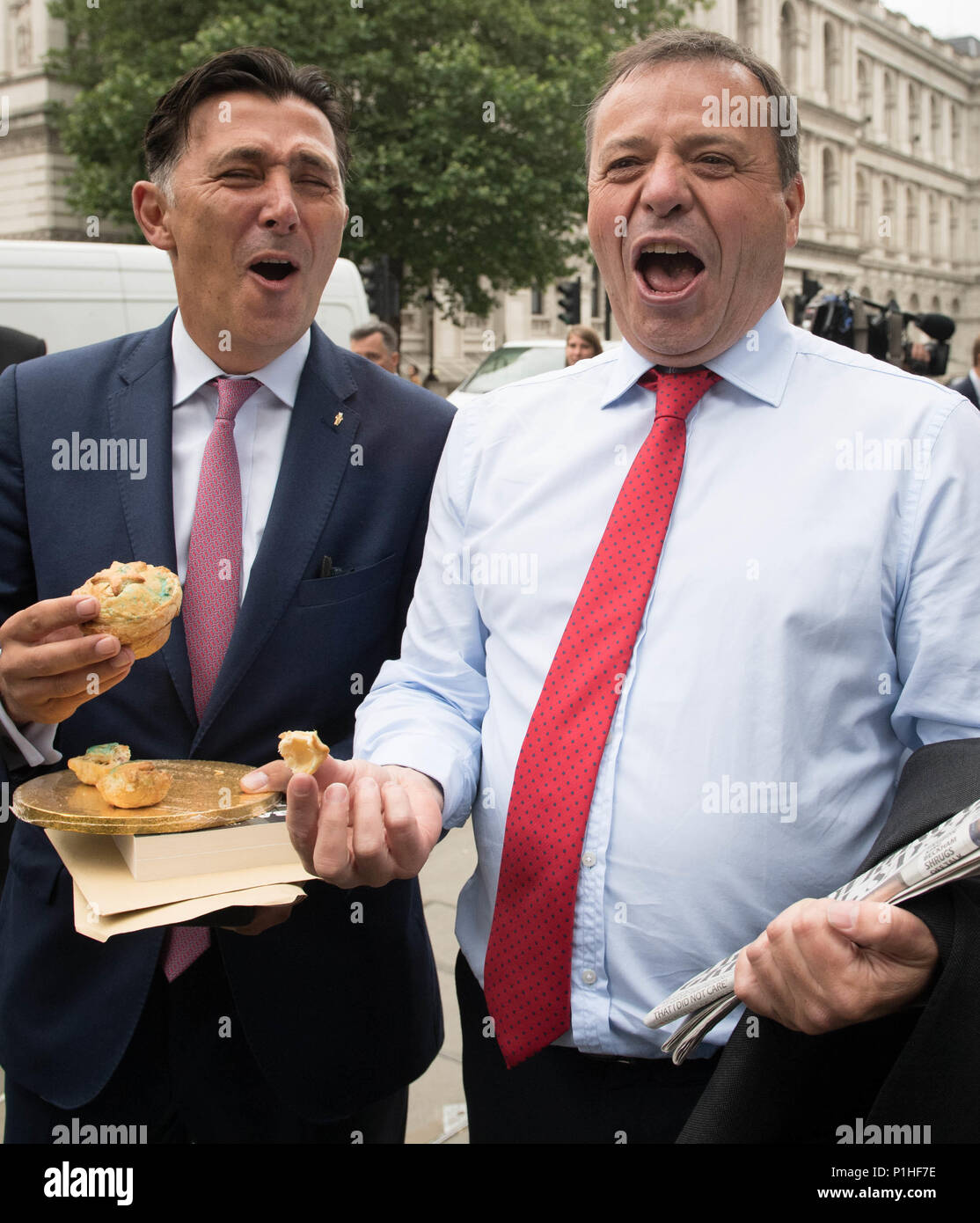 Leave.EU founder Arron Banks (right) arrives at Portcullis House in Westminster, London, with colleague Andy Wigmore. Mr Banks is due to give evidence to the Digital, Culture, Media and Sport Committee inquiry into fake news. Stock Photo