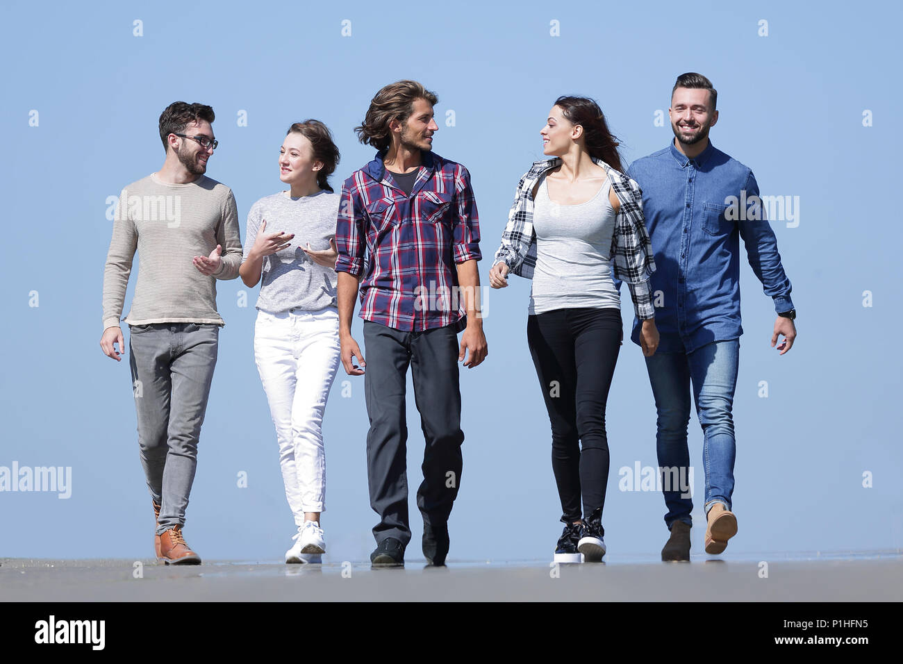 Young adults group diverse walking hi-res stock photography and images ...