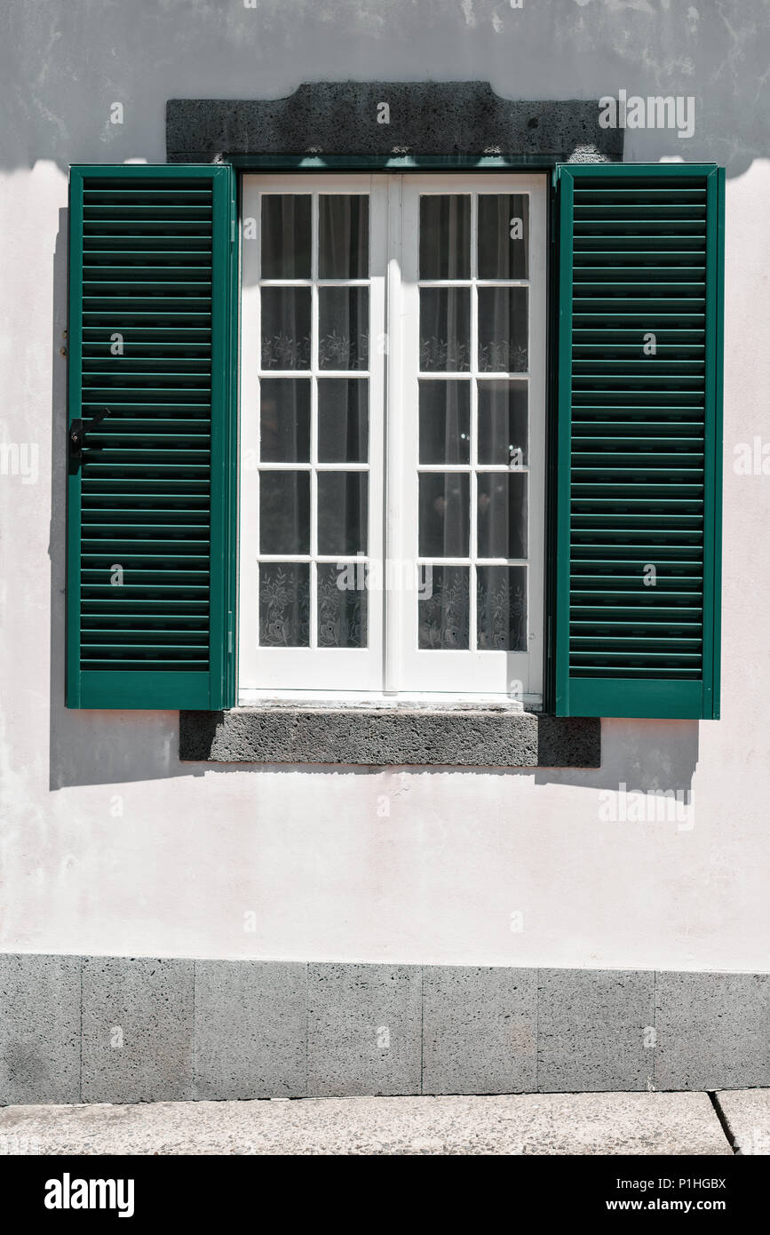 Ornamental facade of colorful house in Sao Miguel, Azores. Portugal