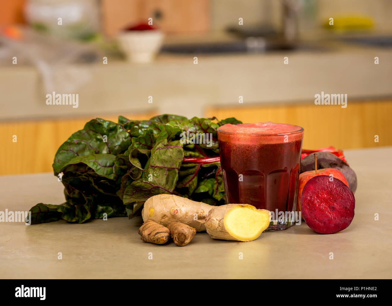 Glass jar of red juice, a detox beverage. Stock Photo