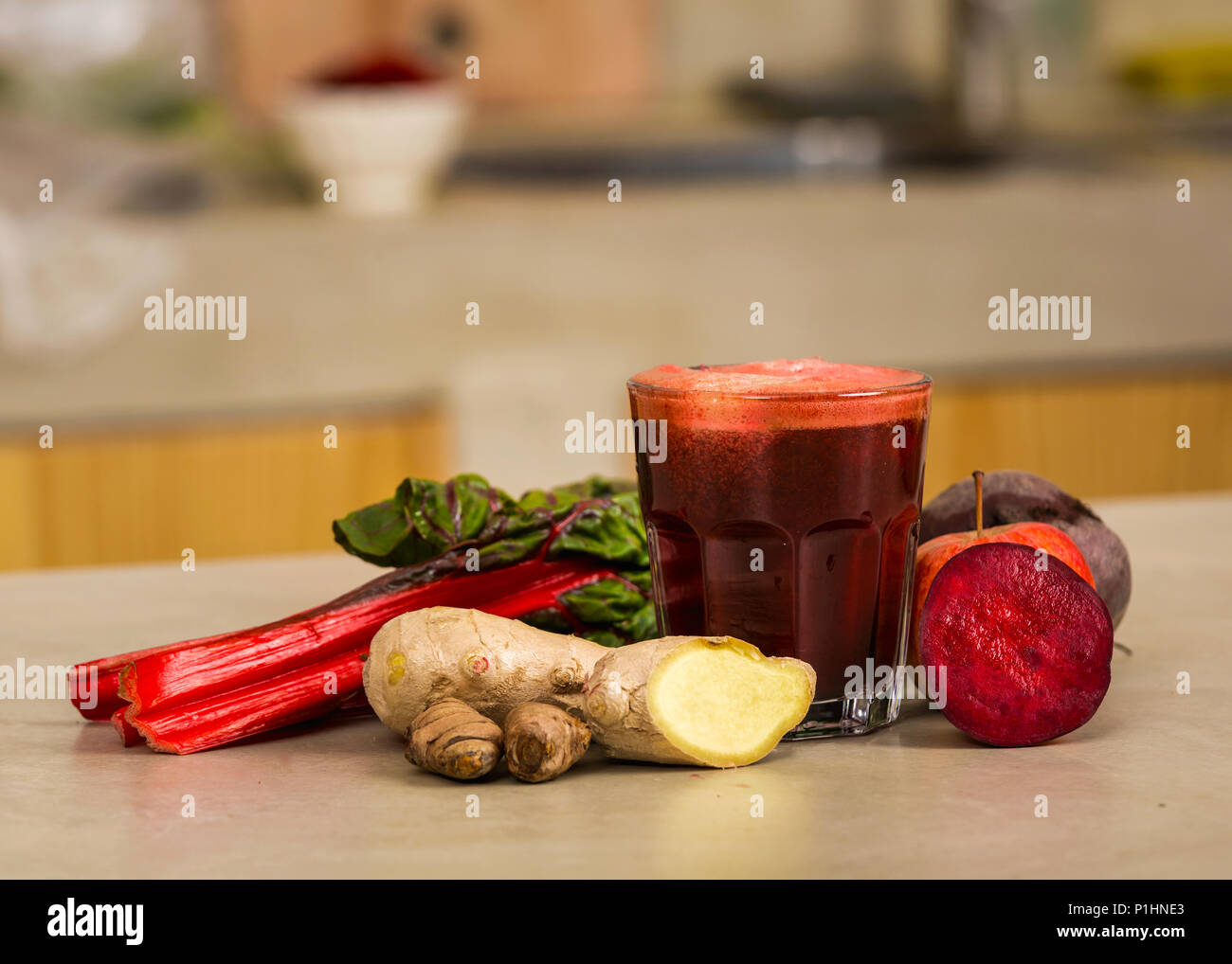 Glass jar of red juice, a detox beverage. Stock Photo