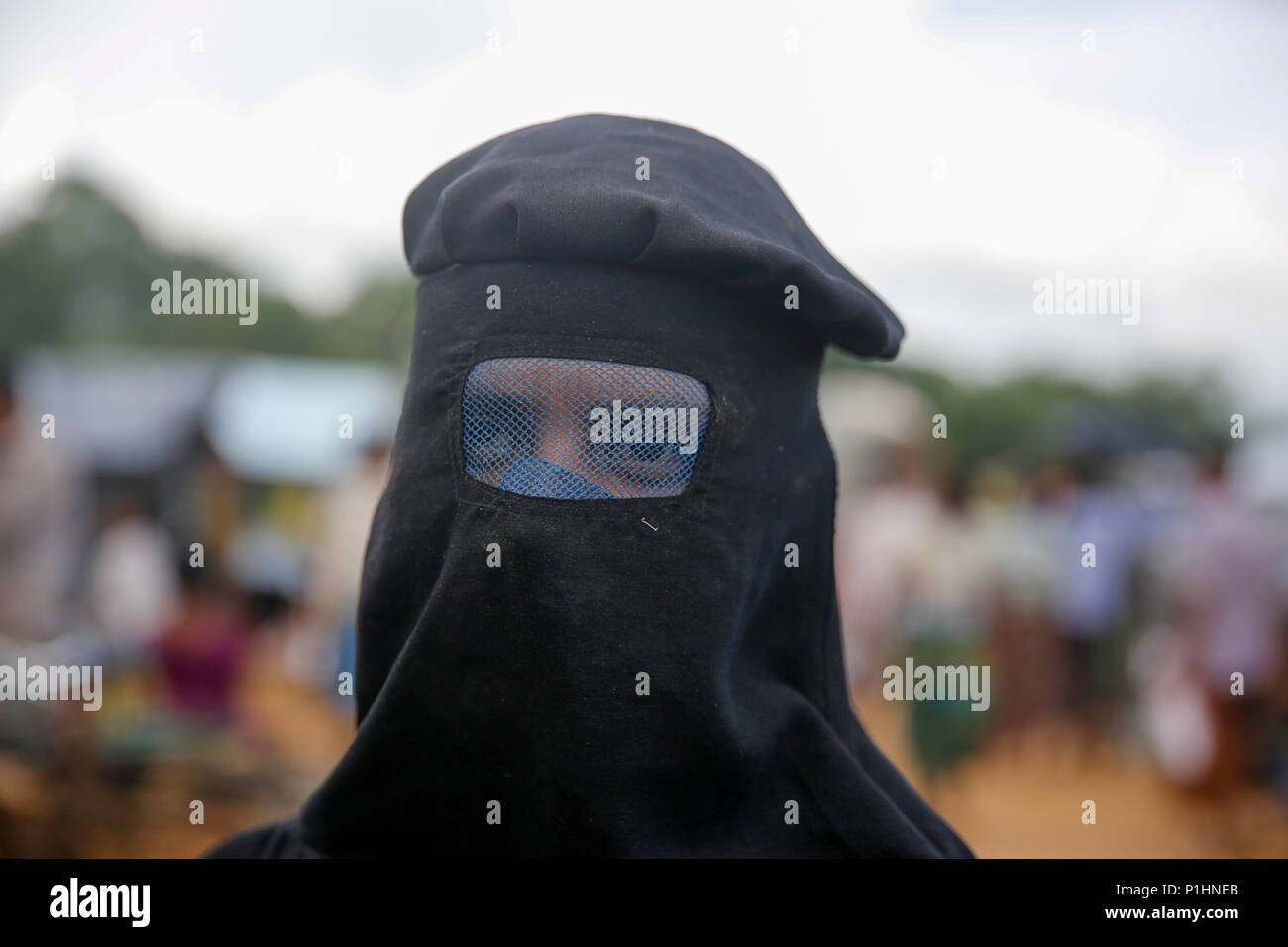 A Rohingya Refugee woman at Kutupalong refugee camp at Ukhiya in Cox's Bazar, Bangladesh Stock Photo