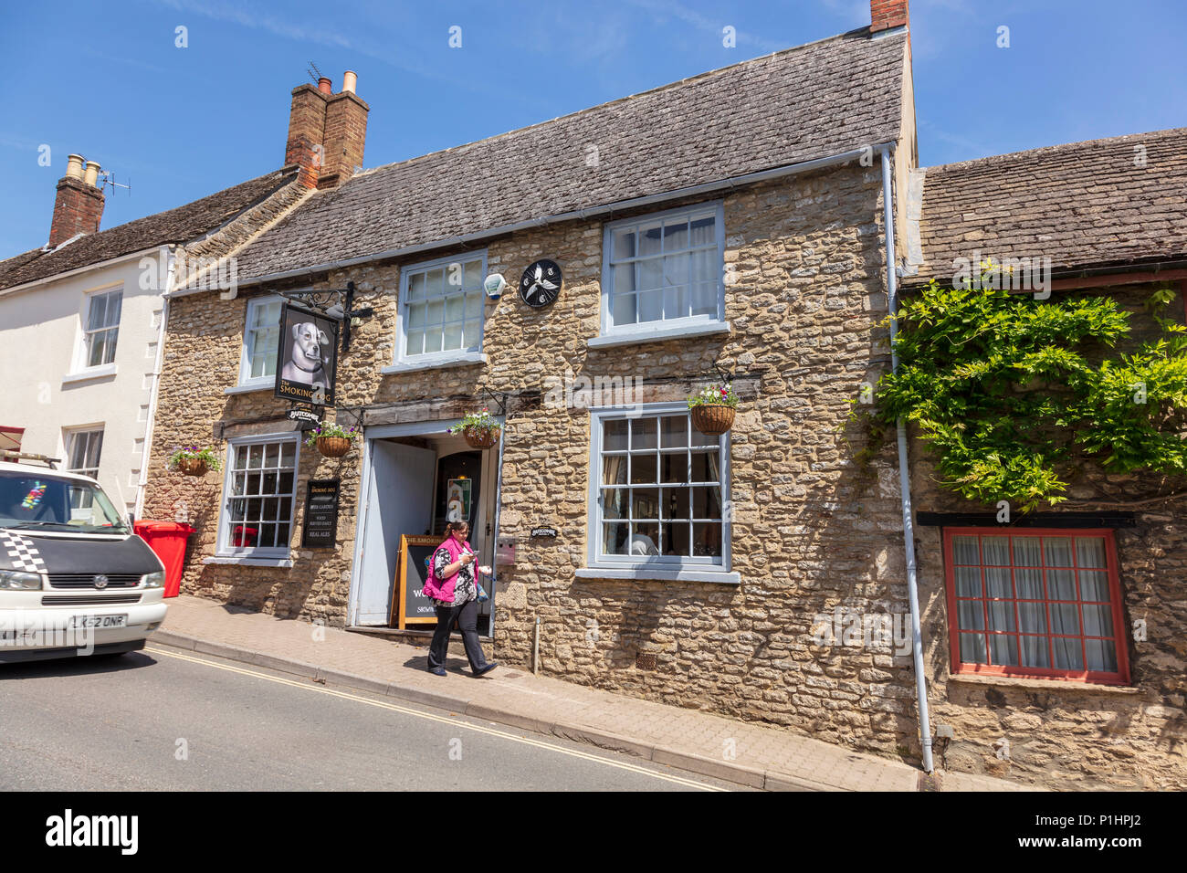 The Smoking Dog on the High Street In Malmesbury. Situated on a hill it is an attractive historic pub. Wiltshire, UK Stock Photo