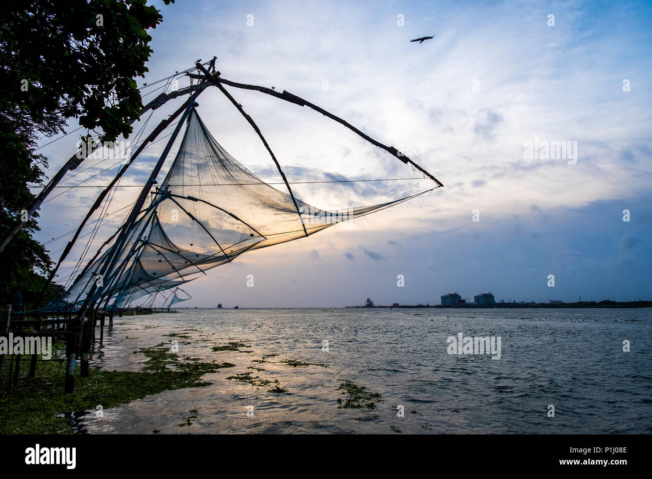 Chinese fishing nets ('Cheena vala') at Fort Kochi, Kochi, Kerala State, India. Stock Photo