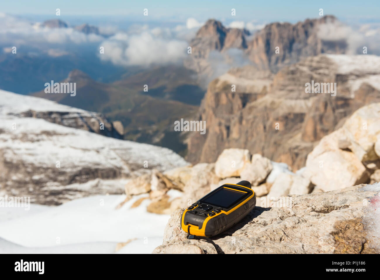 GPS navigator in hand Dolomites Alps Stock Photo