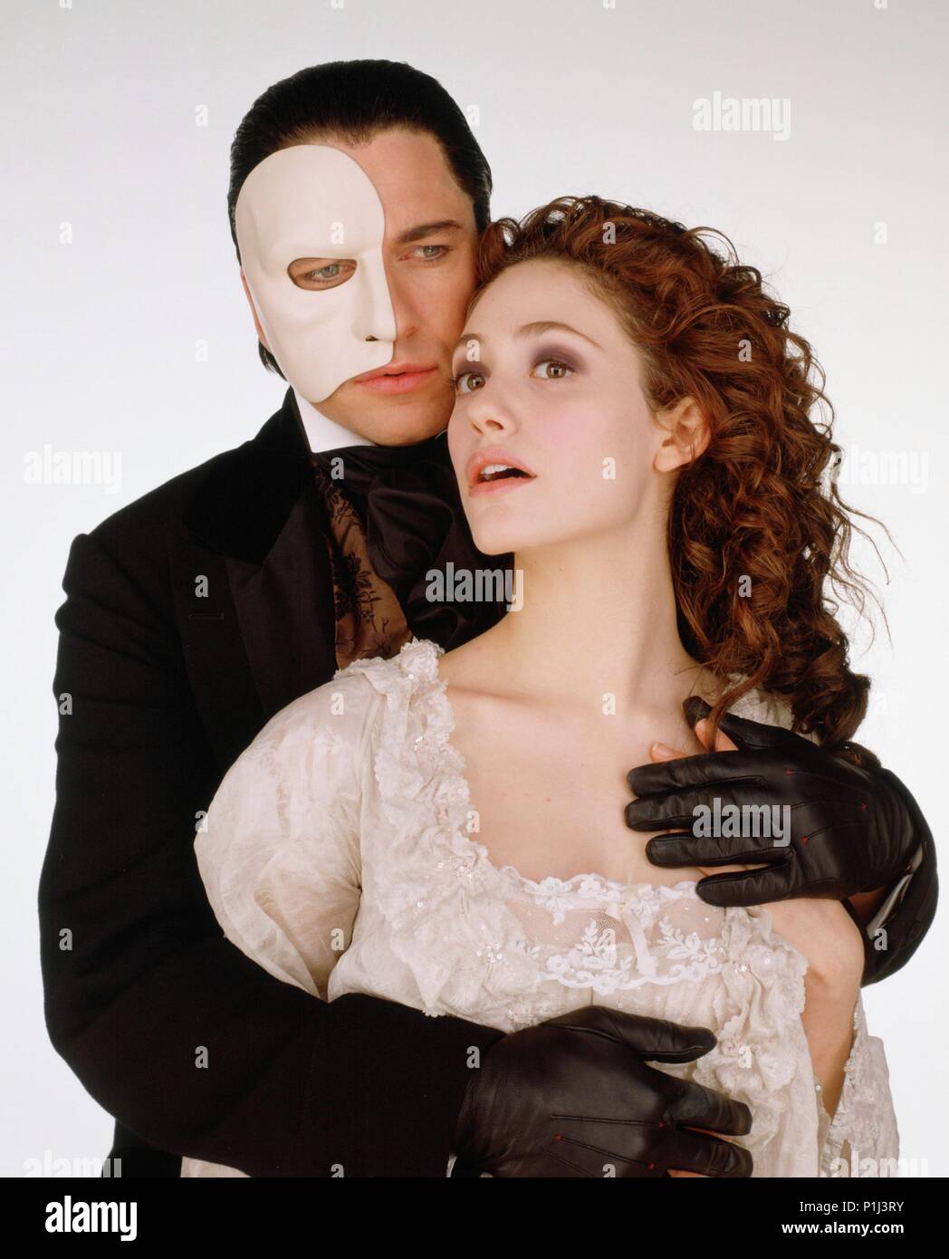 Original Film Title: THE PHANTOM OF THE OPERA. English Title: THE PHANTOM  OF THE OPERA. Film Director: JOEL SCHUMACHER. Year: 2004. Stars: GERARD  BUTLER; EMMY ROSSUM. Credit: WARNER BROS. PICTURES / BAILEY,