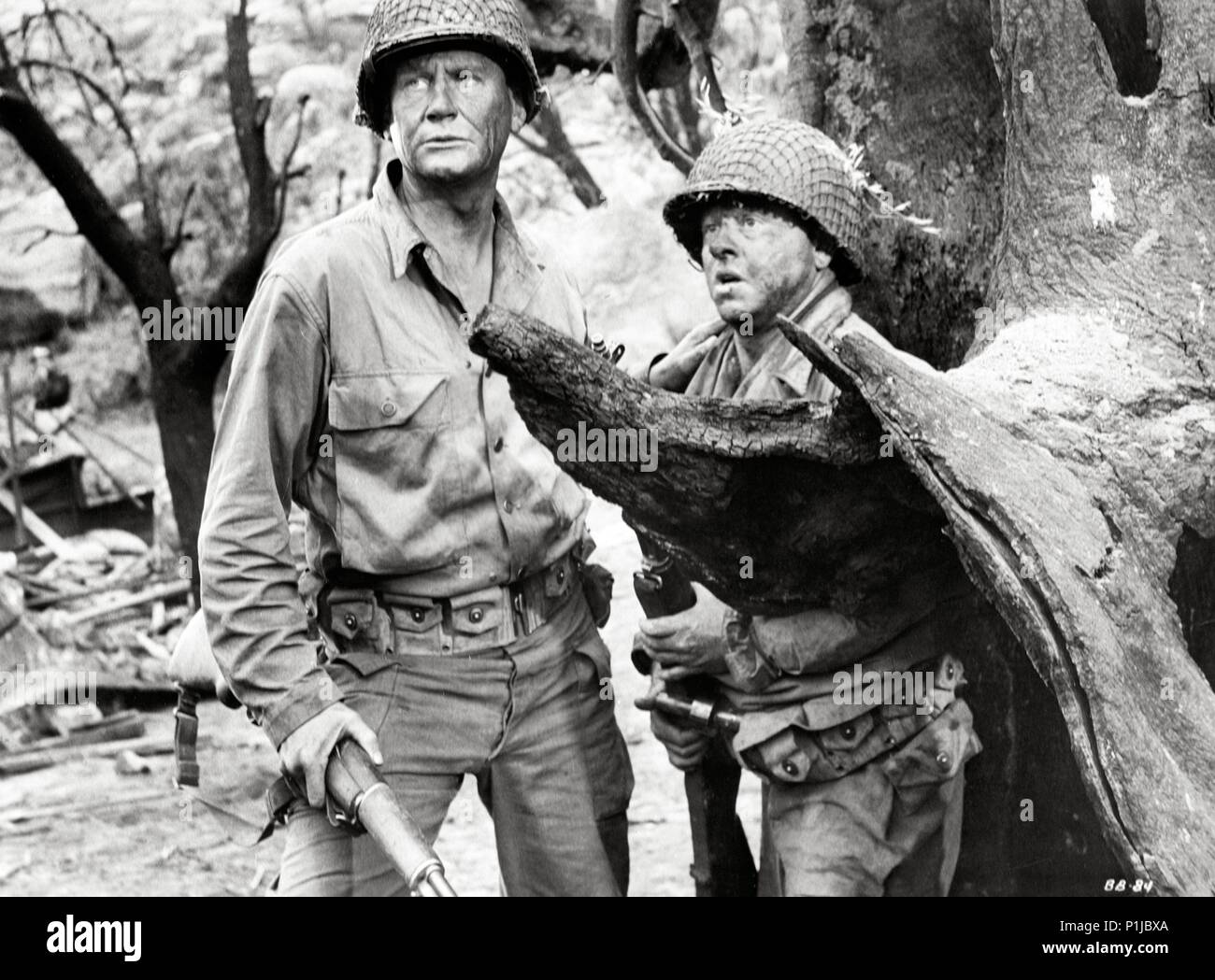 Original Film Title: THE BOLD AND THE BRAVE.  English Title: THE BOLD AND THE BRAVE.  Film Director: LEWIS R. FOSTER.  Year: 1956.  Stars: MICKEY ROONEY; DON TAYLOR. Credit: RKO RADIO PICTURES / Album Stock Photo
