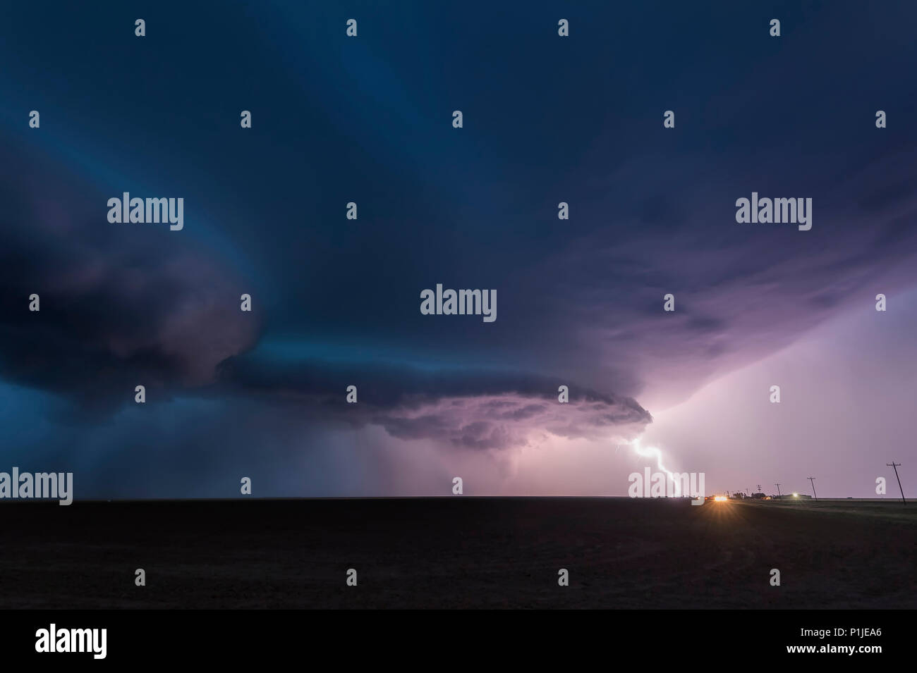 Thunderstorm with low cloud base and lightning at night close to Amarillo, Texas, USA Stock Photo