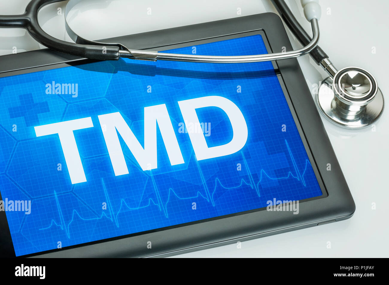 Tablet with the text TMD on the display Stock Photo