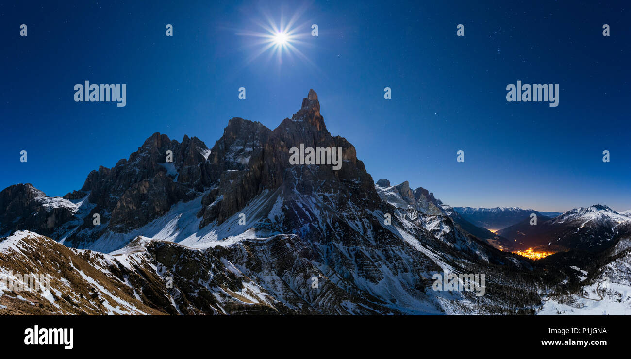 Passo Rolle and Cima the Vezzana at moonlight in winter, Trentino, Dolomites, Alps, Italy Stock Photo