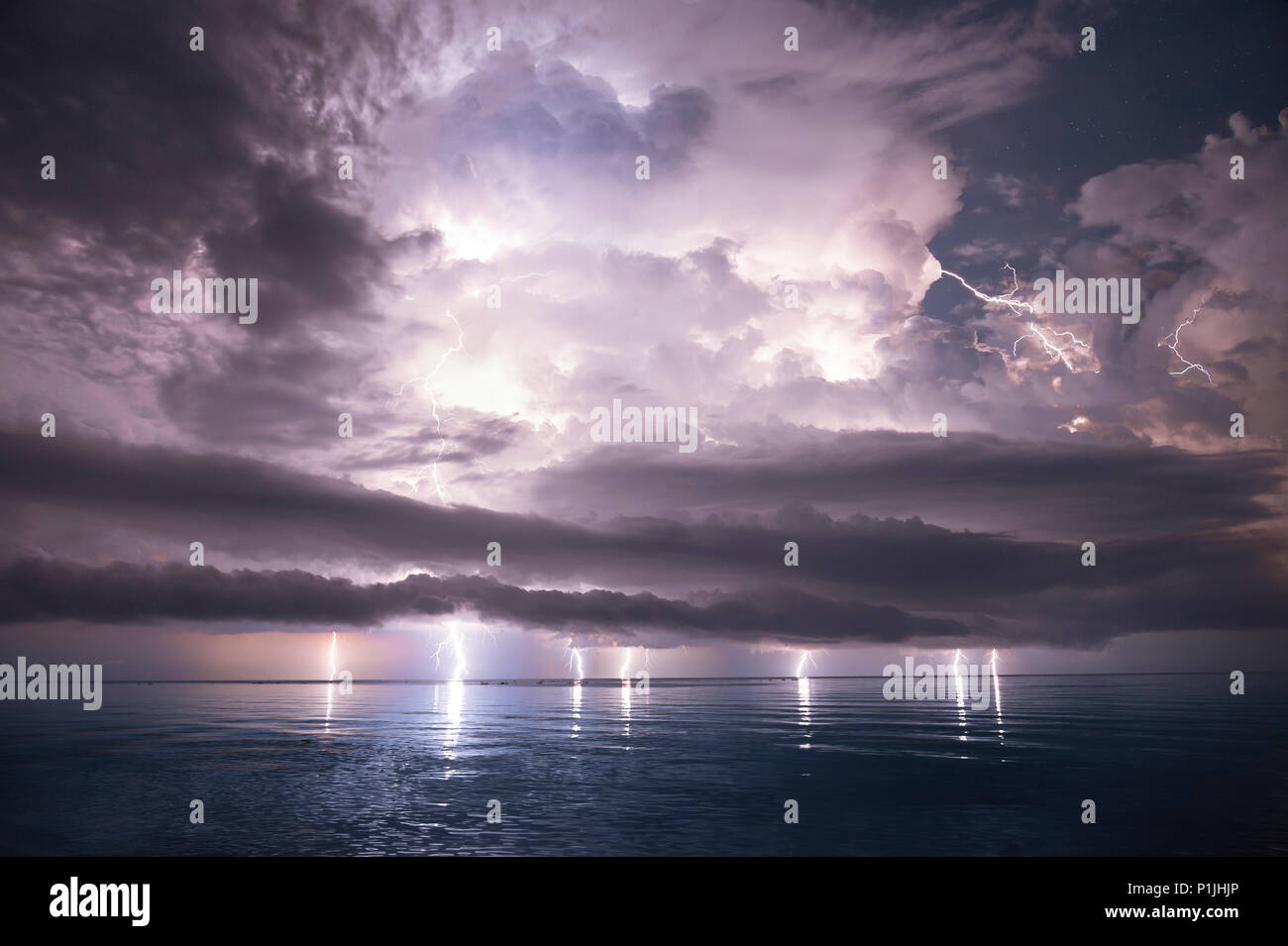 Lightshow of a thunderstorm with developing shelf cloud above the lake Maracaibo (Catatumbo thunderstorm, the place with the highest lightning density worldwide), Ologa, Zulia, Venezuela, South America Stock Photo