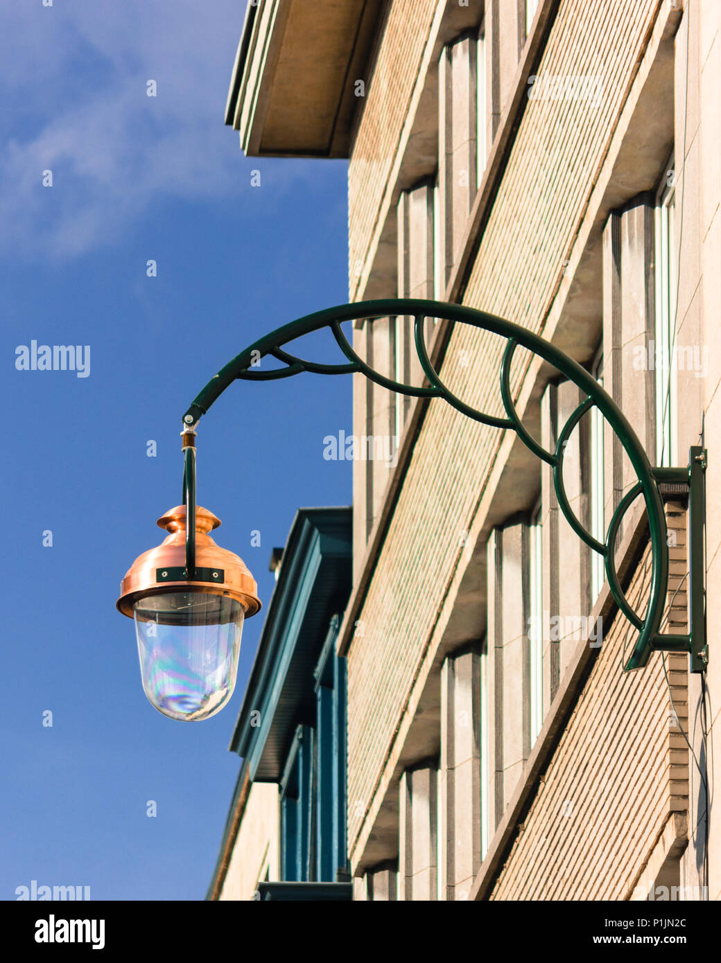 Street light on a building in Brussels, Belgium Stock Photo