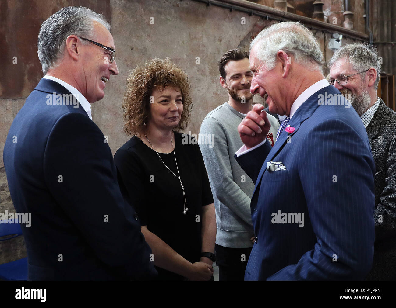 The Prince of Wales with Sinn Fein MLA Caral Ni Chuilin and her colleague Gerry Kelly (left) at Carlisle Memorial Church in Belfast, where Charles is meeting the organisations involved in the regeneration of the building as a permanent home for the Ulster Orchestra. Picture date: Tuesday June 12, 2018. See PA story ROYAL Charles. Photo credit should read: Brian Lawless/PA Wire Stock Photo