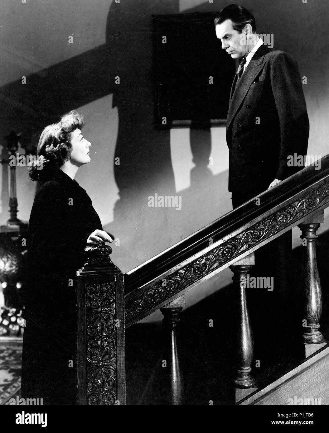 Original Film Title: POSSESSED.  English Title: POSESSED.  Film Director: CURTIS BERNHARDT.  Year: 1947.  Stars: RAYMOND MASSEY; JOAN CRAWFORD. Credit: WARNER BROTHERS / Album Stock Photo