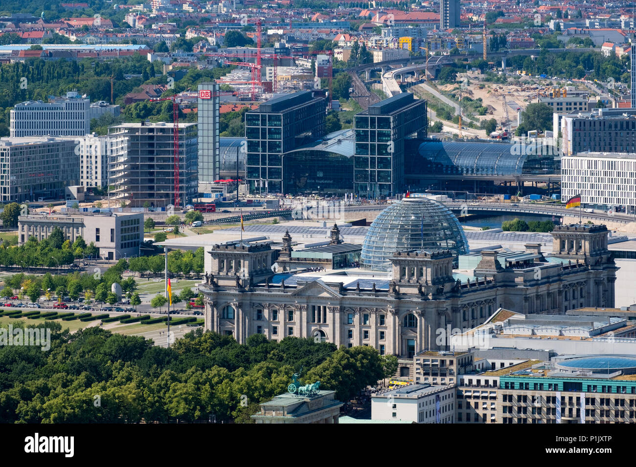 View of the Reichstag German Parliament building and Hauptbahnhof main Railway Station  in Berlin, Germany. Stock Photo