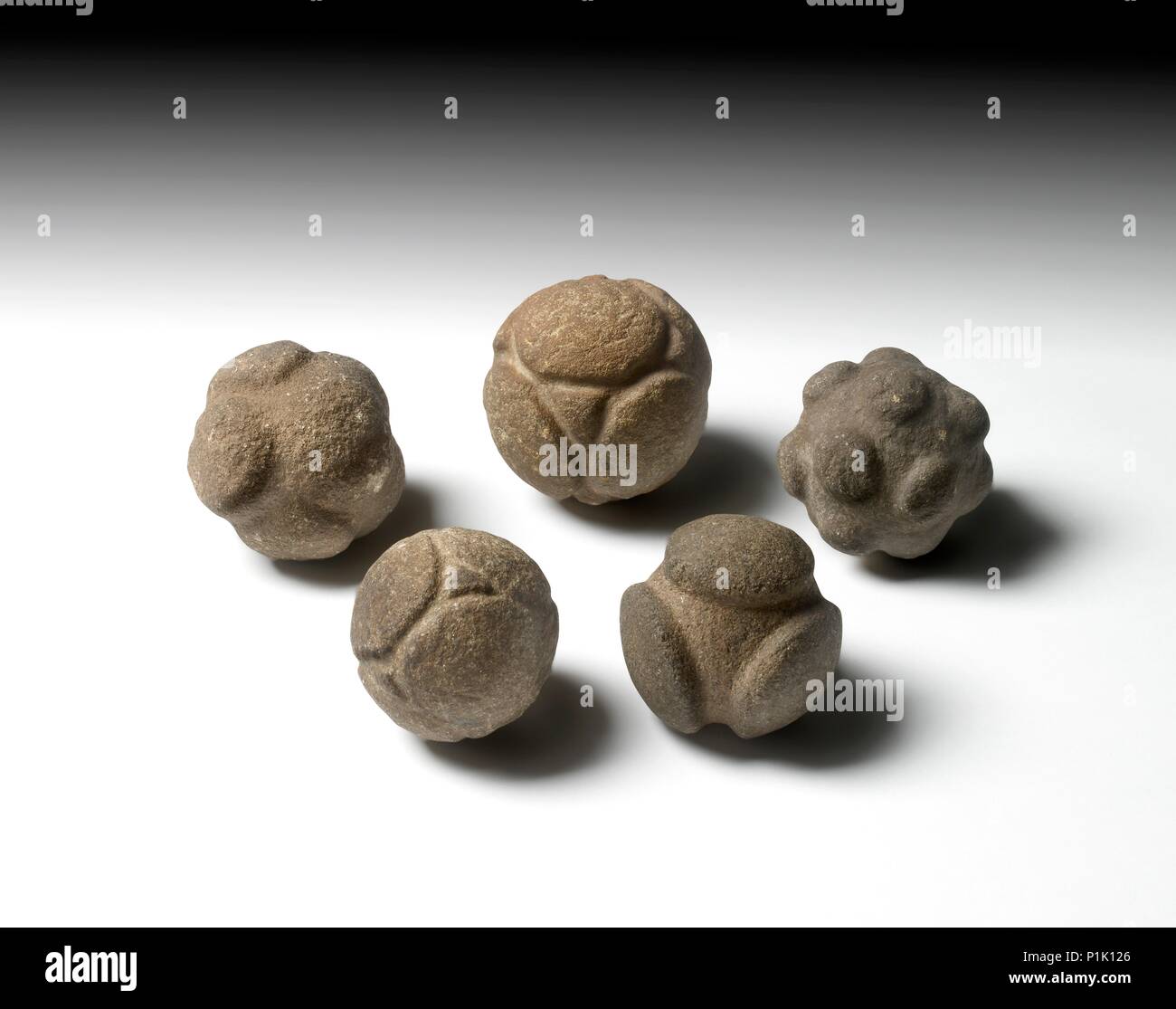 Carved stone balls hi-res stock photography and images - Alamy