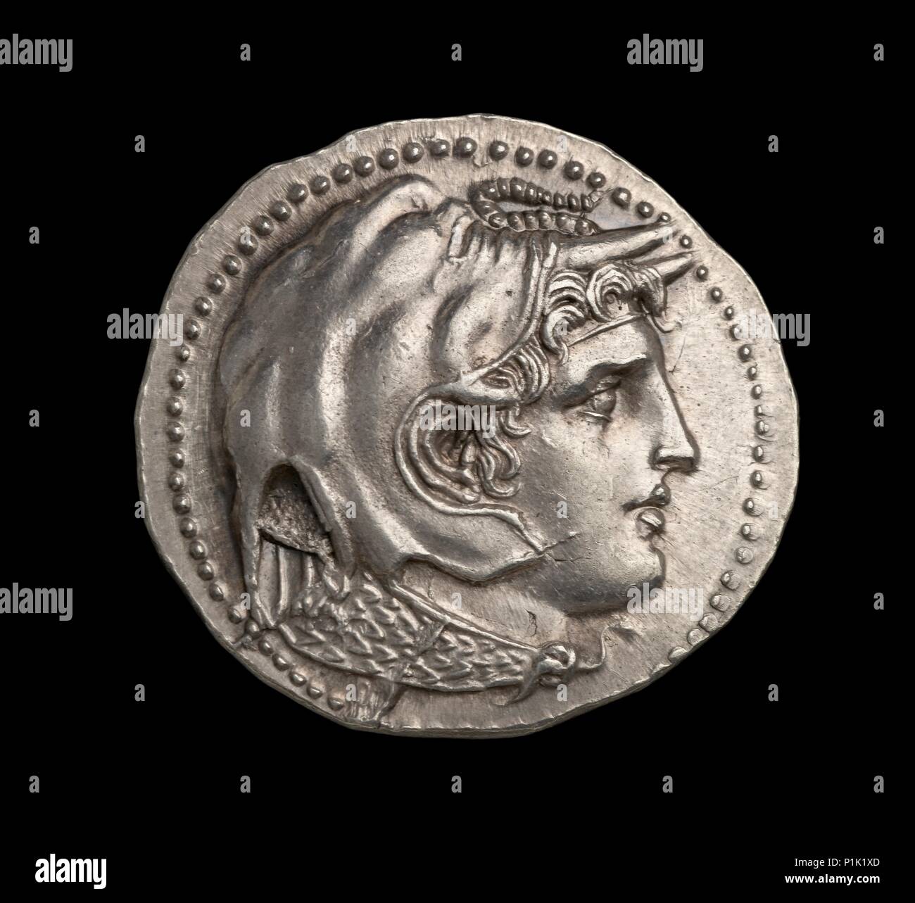 Ancient Greek (Ptolemaic) silver coin, 295 BC.  Dimension: diameter: 31 mmweight: 15.68 gdie-axis: 12 o'clock Stock Photo