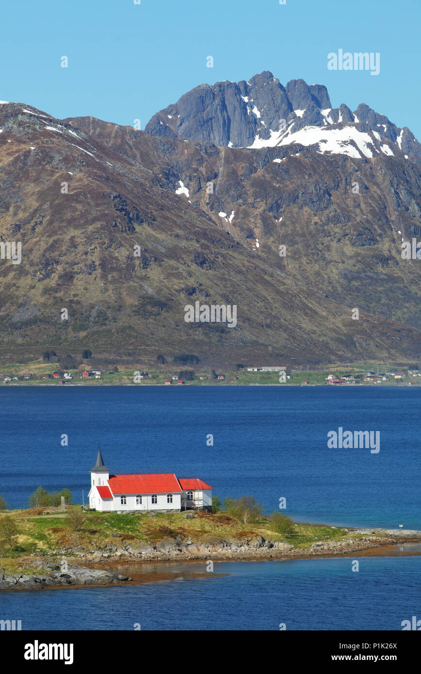 Church in fjord on Lofoten islands in Norway Stock Photo