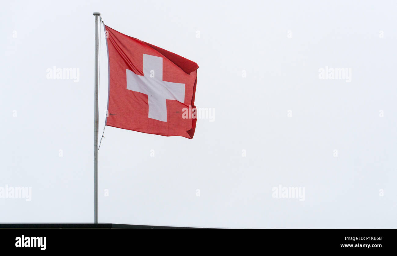 isolated Swiss flag blowing in the wind Stock Photo