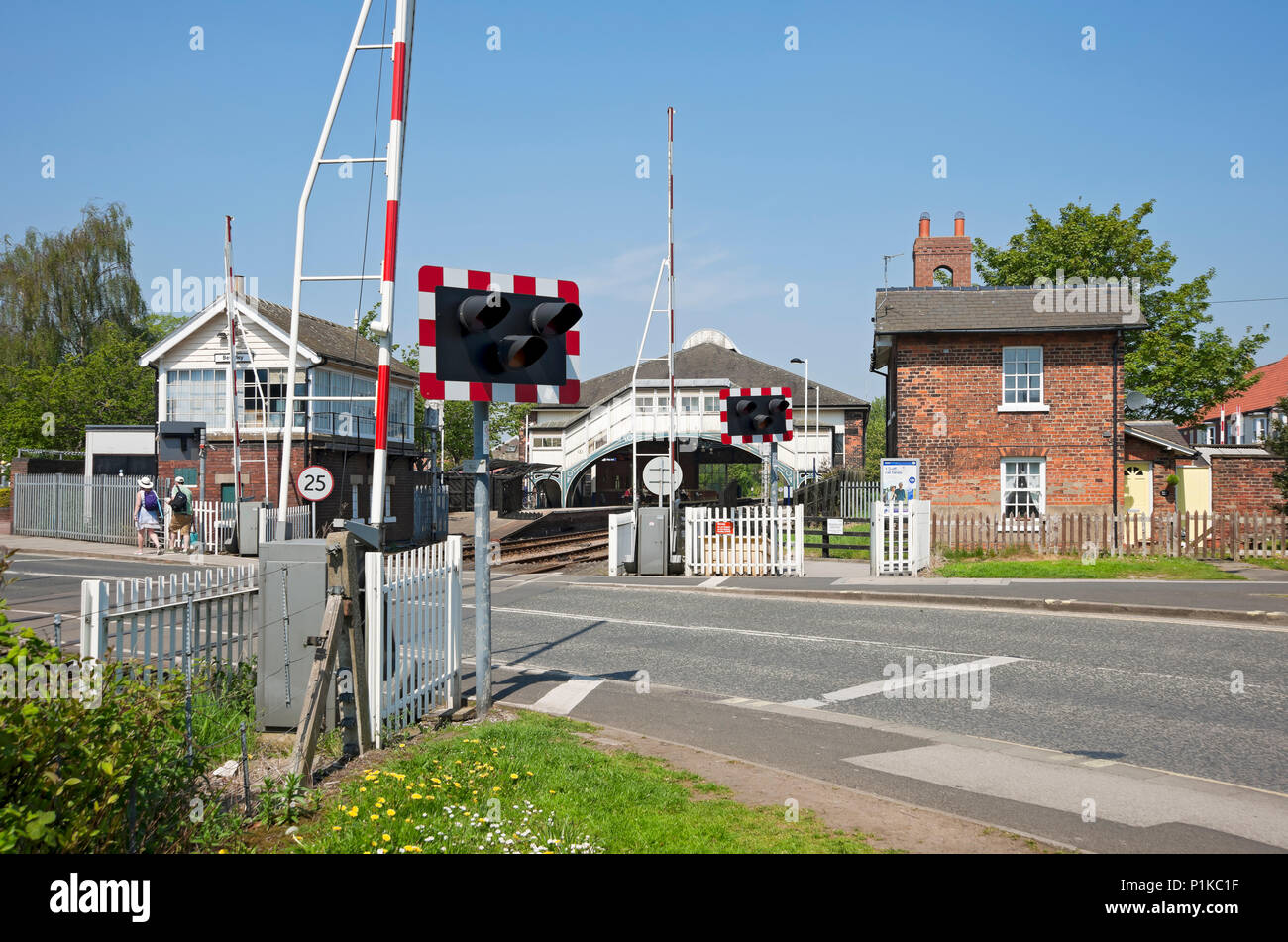 Level crossing and railway train station Beverley East Yorkshire England UK United Kingdom GB Great Britain Stock Photo