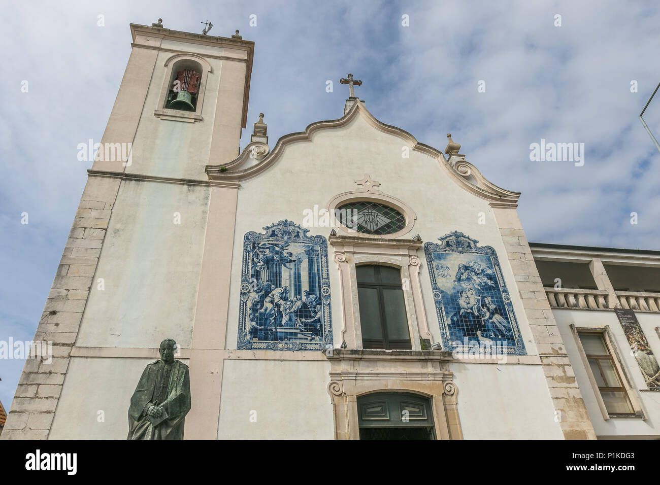The Vera Cruz Church in Aveiro, Portugal. Azulejo tiled panels on the facade. Stock Photo