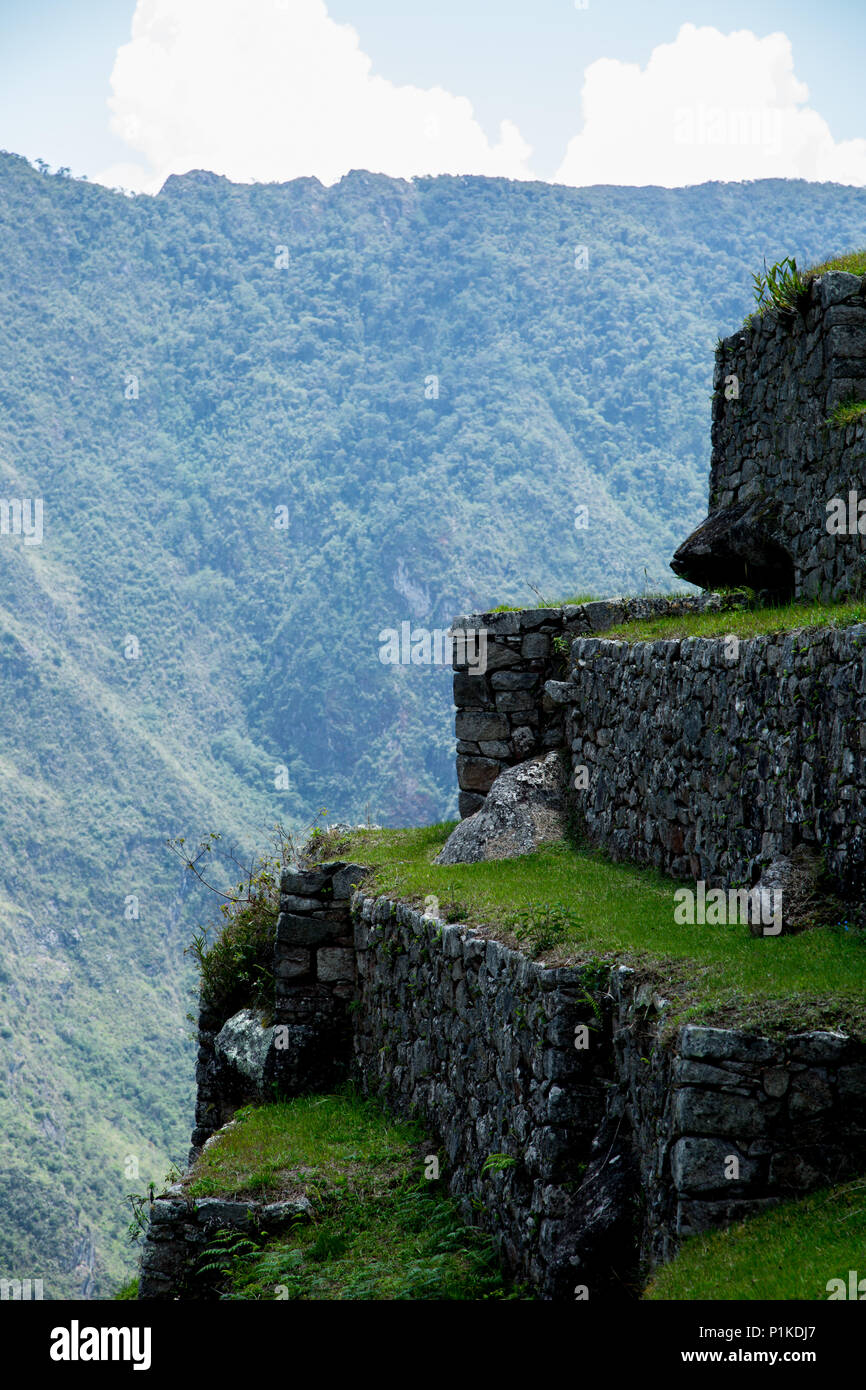 The steep, terraced hillside at Machu Picchu where in Peru, where it is believed farming either occurred or was meant to occur. Stock Photo
