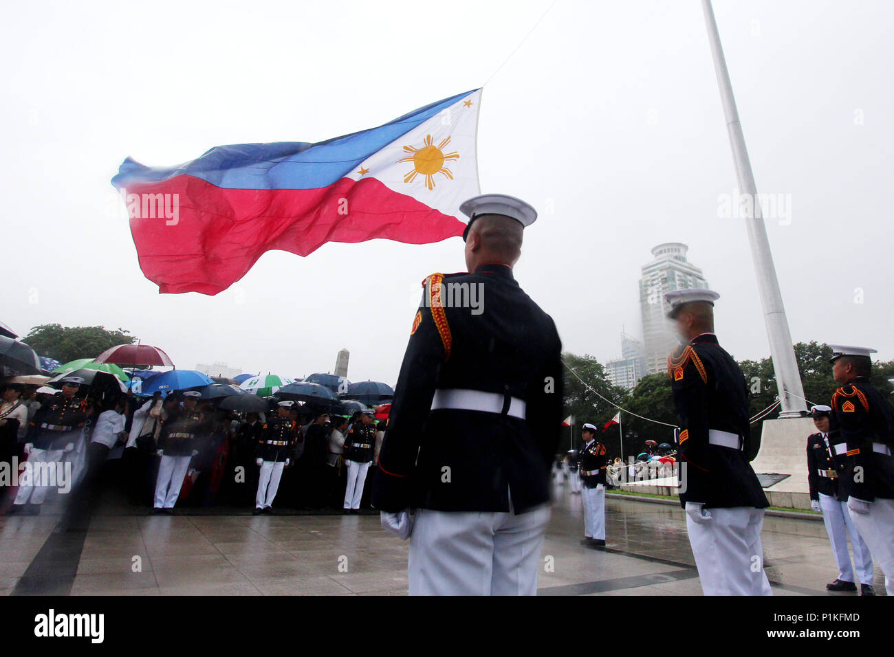 Philippines. 12th June, 2018. Members of Philippine Marines release the Philippine flag during the 120 Philippine Independence Day Philippine at Rizal Monument in Rizal Park, Manila City on June 12, 2018. Credit: Gregorio B. Dantes Jr./Pacific Press/Alamy Live News Stock Photo