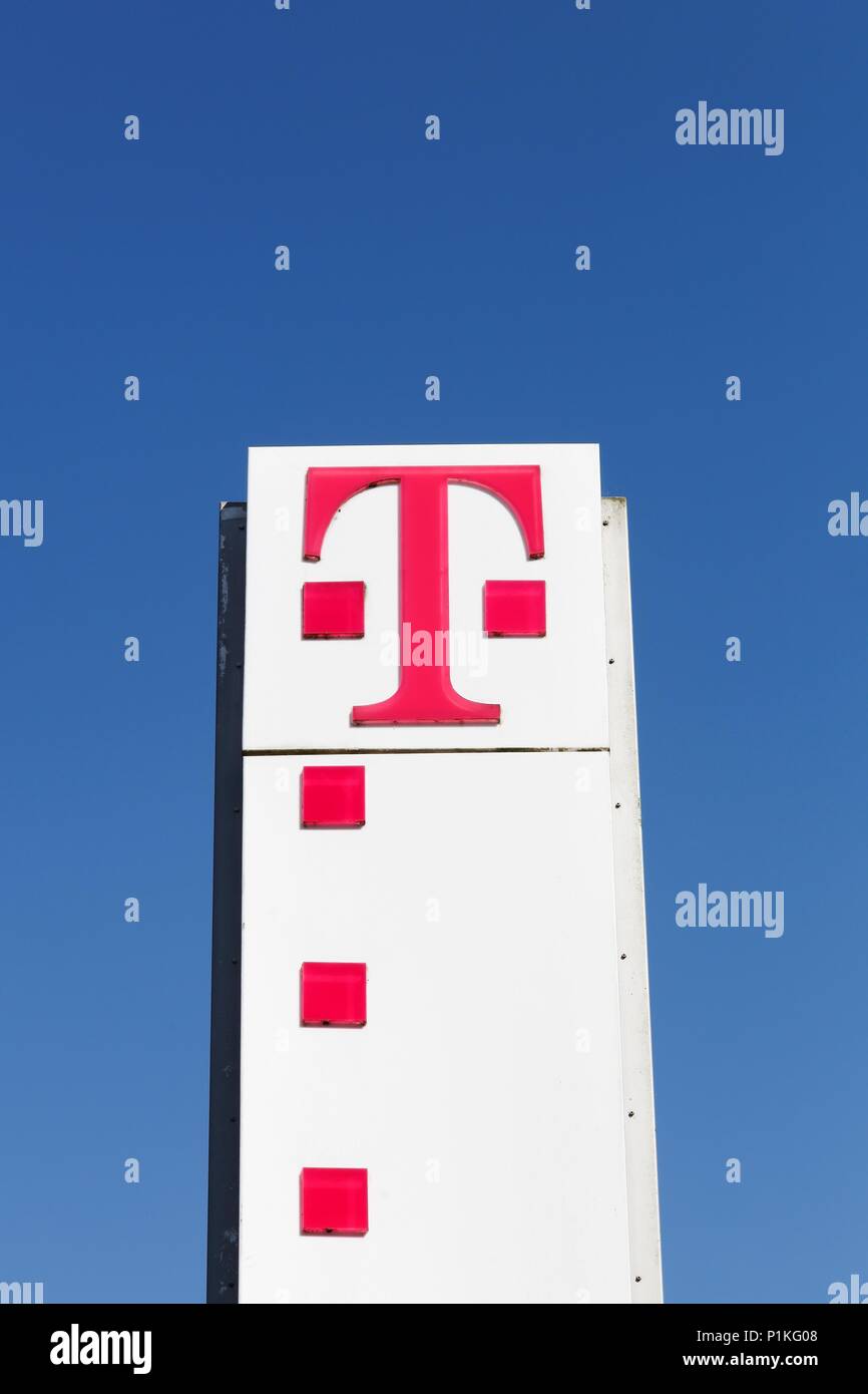 Flensburg, Germany - June 4, 2016: Deutsche Telekom sign on a panel. Deutsche Telekom is a German telecommunications company headquartered in Bonn Stock Photo