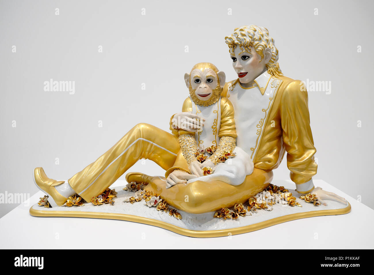 Gold Michael Jackson and Bubbles sculpture wearing gold military-style suit by American artist Jeff Koons USA Stock Photo