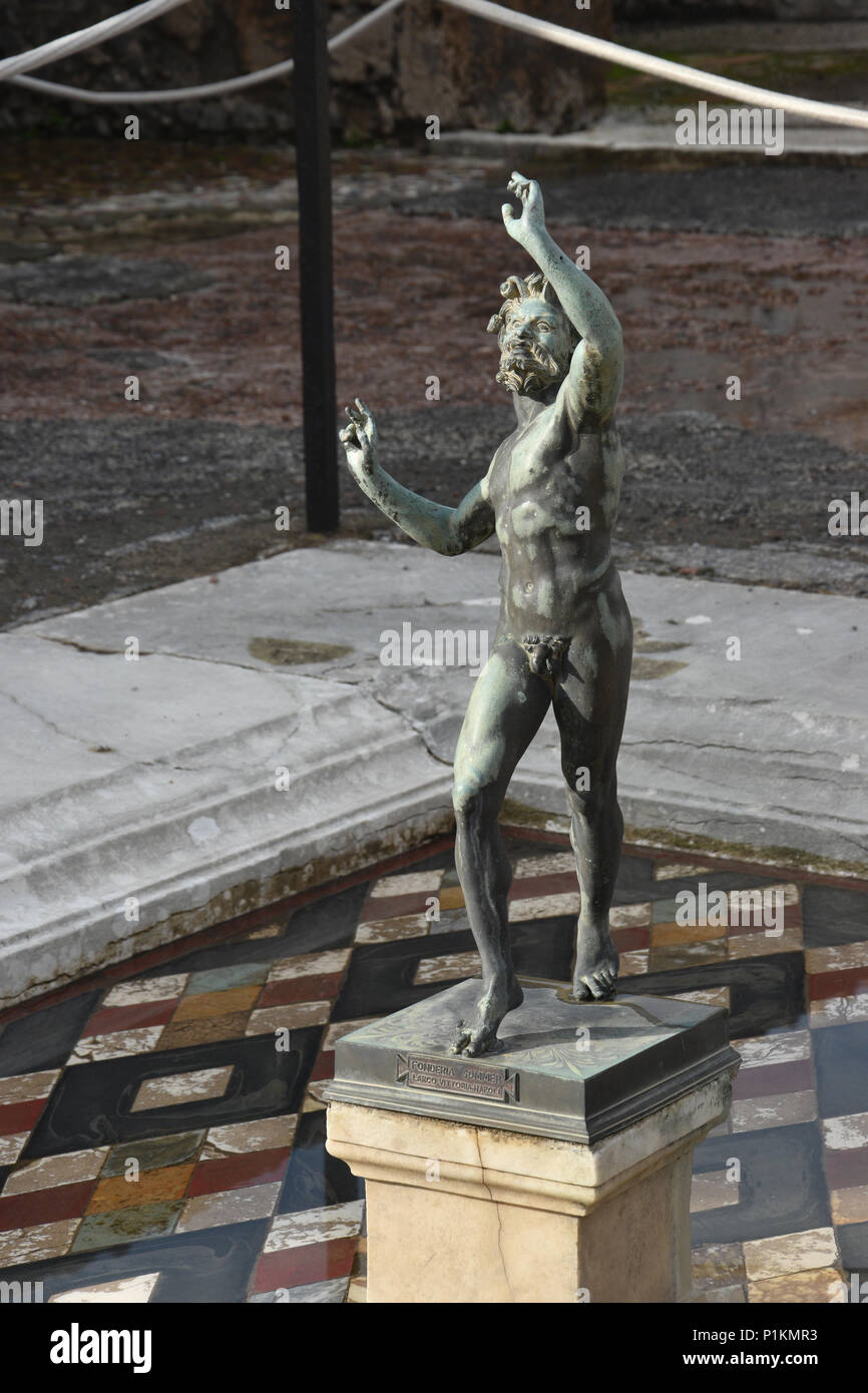 Statue in the Courtyard in the House of the Faun in the Ancient CIty of Pompeii, Italy. Stock Photo