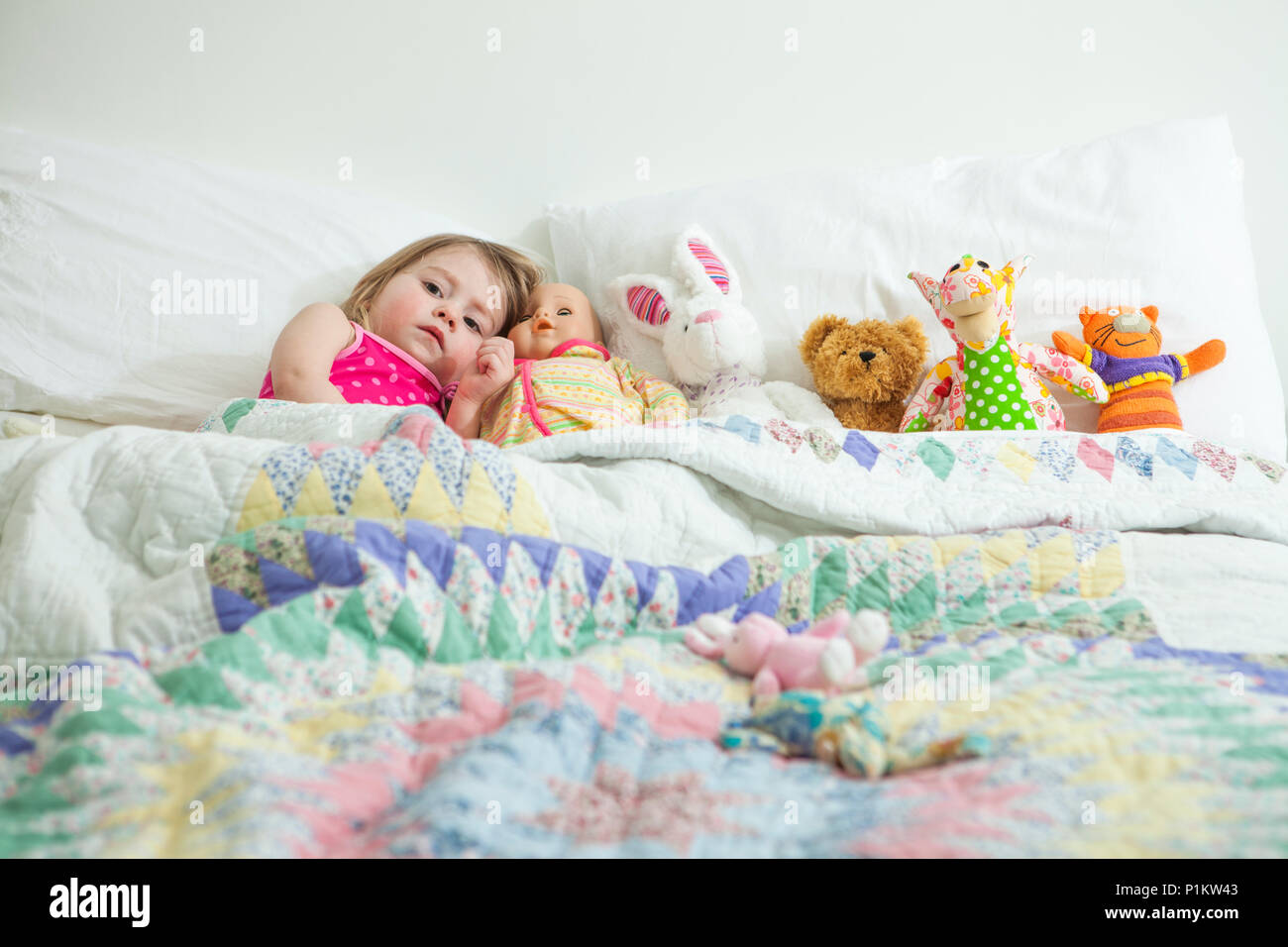 Child Tucked Bed High Resolution Stock Photography and Images Alamy