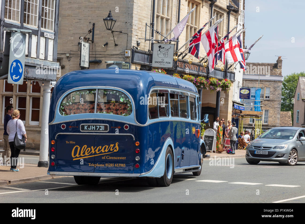 Alexcars of Cirencester's Bedford OB/Duple C29F coach(1949) in the Market town of Tetbury on a busy summer day, Gloucestershire, UK. For a wedding Stock Photo