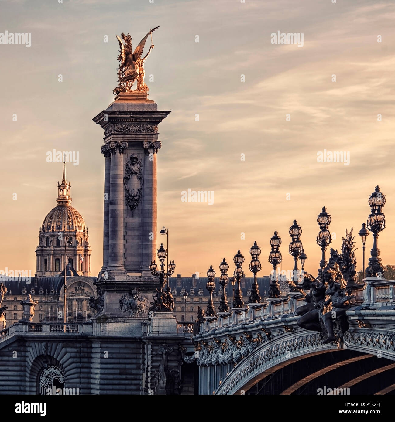 Bridge Alexandre III and Hotel des Invalides in Paris Stock Photo