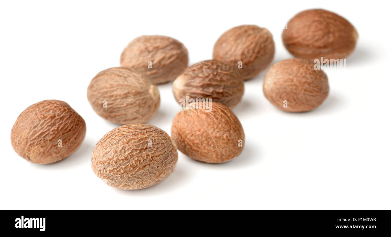 dried nutmeg isolated on the white background Stock Photo - Alamy